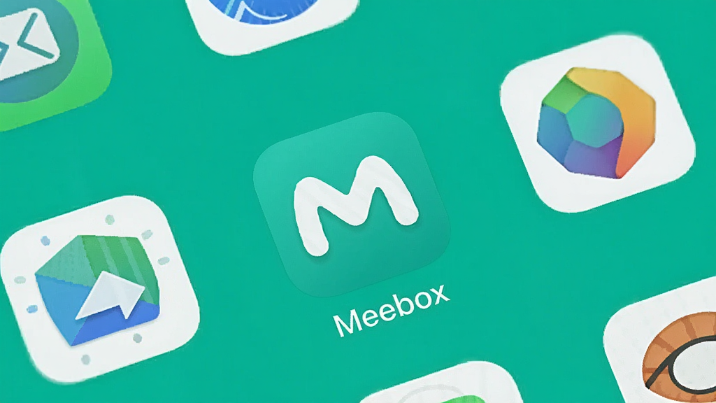 一张手机桌面展示图,画面中央为“Meebox”应用图标,图标设计简洁,背景为纯色,周围有少量其他应用图标,布局为手机主屏样式,风格为极简主义,细节上图标边缘清晰、无多余装饰,画质高清,画面干净,无多余元素
