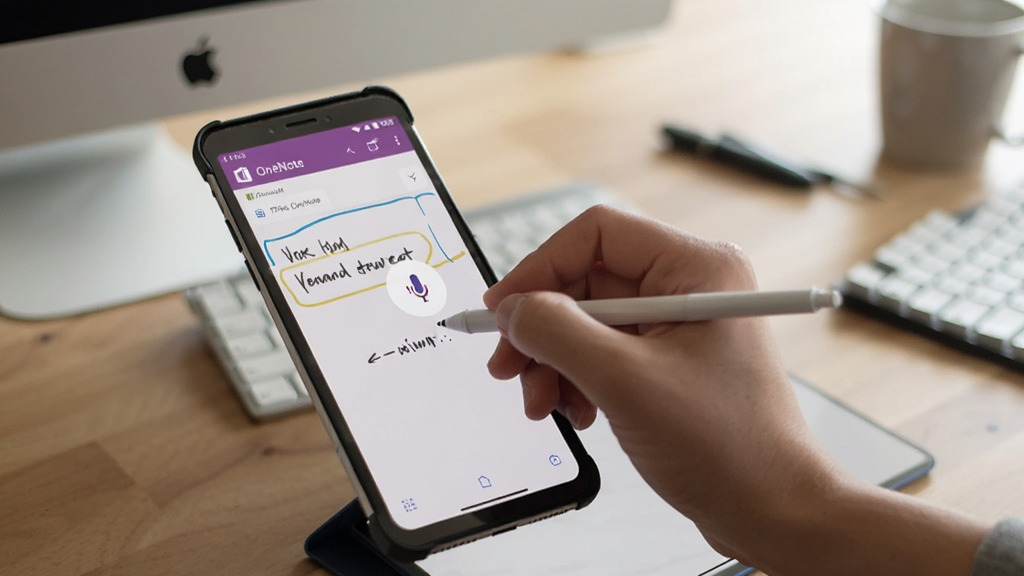 一幅展示 Microsoft Office OneNote 在手机和平板上使用的场景图,画面中一只手正在触屏上用手指书写笔记,旁边有语音输入图标,背景是模糊的办公桌,整体风格自然写实,光线柔和,突出移动端便捷性,画质清晰,无多余元素。