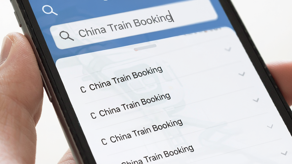 主体是一个手机屏幕显示车站搜索界面,搜索框中用灰色字体写着“China Train Booking”,下方列出多个匹配的车站名称,布局为垂直列表式,风格为扁平化UI设计,细节上突出搜索图标和车站名称的排列,画质清晰干净,无多余元素